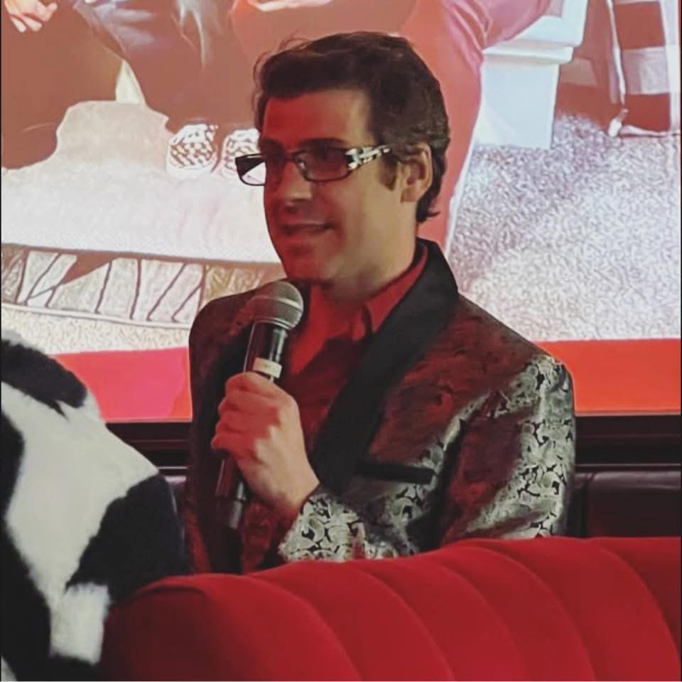 Michael Mapes speaking at a live event
